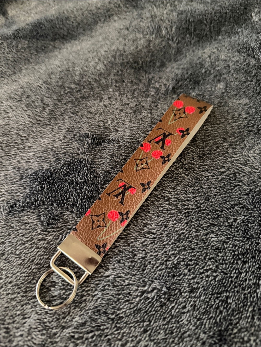 Designer-Inspired Brown Leather Wristlet Keychain with Pink Floral Accent